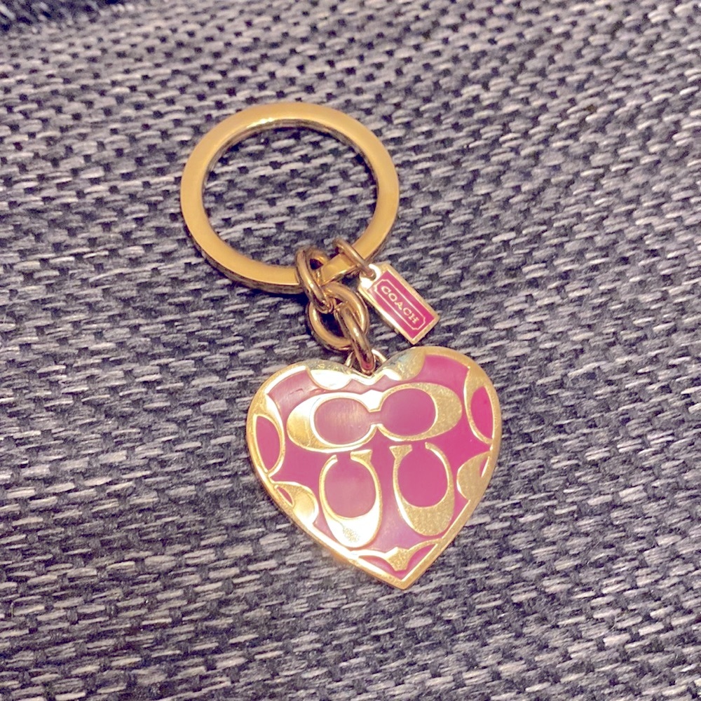 NWOT coach gold and pink heart keychain signature Cs